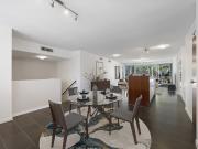 Two Story Penthouse with Riverside Elegance