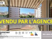 UN APPARTEMENT 3 PIECES, AVEC BALCON, AU CENTRE VILLE DE PER