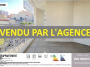 UN APPARTEMENT 4 PIECES, AVEC TERRASSE ET PARKING, AU CENTRE