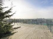 Un penthouse avec terrasse sur le toit et vue