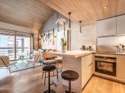 Un séjour cathédrale face aux pistes 48m² Courchevel