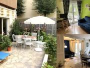 Une lumineuse chambre avec terrasse et jardin