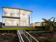 Unfurnished Brand New Waterfront Home with Dual Living