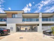 UNFURNISHED modern first floor apartment with secure parking