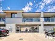 UNFURNISHED modern first floor apartment with secure parking