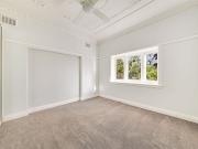 Unfurnished one bedroom with separate sunroom or study