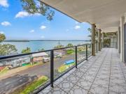 UNINTERRUPTED LAKE VIEWS IN A GREAT LAKESIDE LOCATION