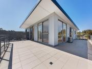 Unique Penthouse Living Surrounded by Expansive Outdoor...