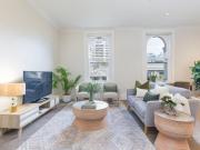 Unique Top Floor Character Apartment in Boutique Block