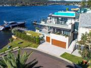 UNRIVALLED WATERFRONT LUXURY ARCHITECTURAL MASTERPIECE...