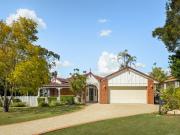 Unwind to city and Mt Coot tha views in this prestige...