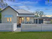 Updated charm, expansive block with great shed and side...