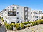 Updated garden apartment in prime coastal locale