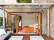 Updated in/outdoor terrace in quiet leafy cul de sac