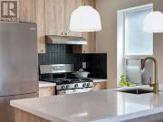 Upper 27 Marigold Avenue, Toronto, ON, M4M 3B1 house for...