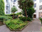 Vacant 2 room apartment with view into the green courtyard
