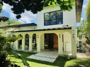 Vacation House with Pool and Lush Garden For Sale in...