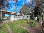 VENDE CASA C/PARQUE Y COCHERA
