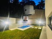 Vende se Casa NOVA 3 suítes, piscina linda em cond Cond....