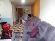 VENDO AMPLIO APARTAMENTO CON PARQUEADERO CUBIERTO