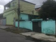 Vendo amplo terreno murado com 4 casas. Local calmo e...
