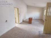 vendo gran terreno con departamento y cocheras