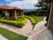 vendo parcela con casa