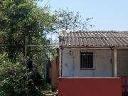 VENDO TERRENO 300mts2 CON CASA PEQUEÑA EN COLONIA PUERTO...