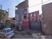 VENDO TERRENO INDUSTRIAL EN COMAS