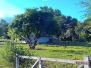 Vendo terreno Villa Posse 12650 con 2 casas