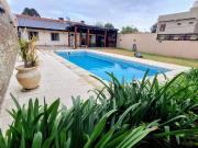VENTA 2 CASAS 590 M2 PILETA CLIMAT. B° UNO EZEIZA