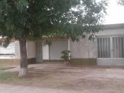 Venta casa dos dormitorios y local en Maria Luisa