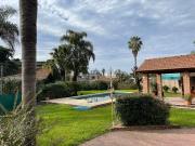 VENTA CASA EN EL CENTRO DE FUNES PILETA Y JARDIN