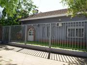 VENTA DE CASA CON COCHERA Y QUINCHO. IMPECABLE