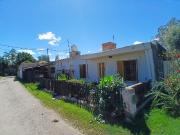 VENTA DE CASA CON GRAN TERRENO + DOS DPTOS