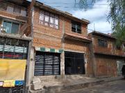 Venta de casa con local comercial
