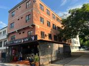 VENTA DE EDIFICIO ESQUINERO CON LOCALES Y APARTAMENTOS...