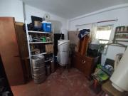 VENTA DE LOTE CON CASA EN BARRIO SEMI CERRADO