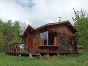 VENTA DE PARCELA CON 3 CABAÑAS A 5 KM DEL CENTRO DE...