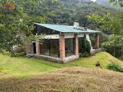 Venta de terreno con Hostal en Cotacachi, 5 ha