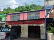 venta de terreno con locales y un pequeño departamento