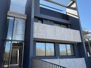 VENTA DEPTO 2 DORM CON PATIO MANANTIALES 1