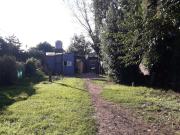 VENTA LOTE CON MEJORAS LIBERTAD MERLO FINANCIA