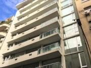 Venta Dos ambientes amoblado piso alto con cochera fija