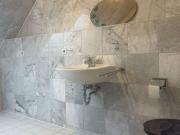 Vermietete Dachgeschosswohnung mit einem Stellplatz im...