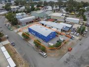 Versatile Industrial Facility with Showroom and Secure Yard
