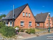 Vierfamilienhaus mit Garten