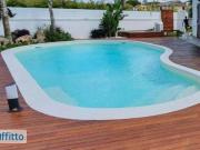 Villa a schiera arredata con piscina