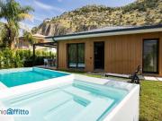Villa a schiera arredata con piscina