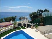 Villa en Cala Canyelles con piscina y vista a mar